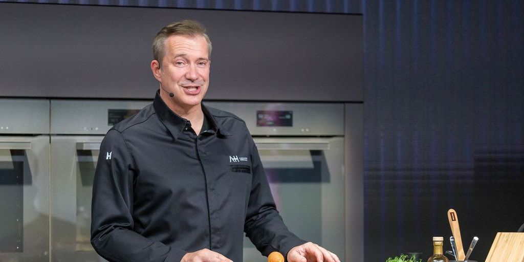 man applying cream in Germany with benefits text overlay in Hindi