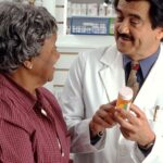 woman consulting doctor in clinic